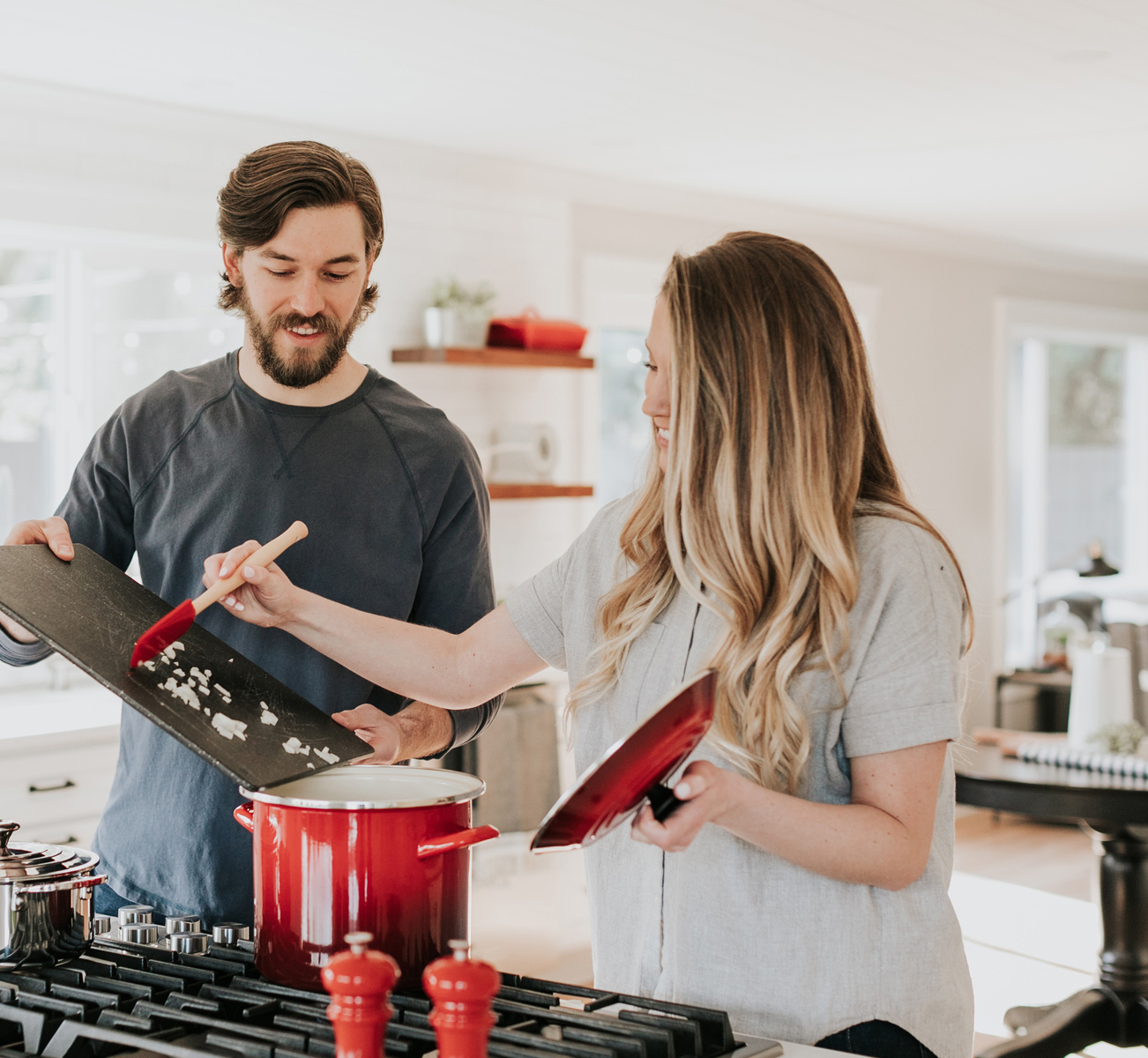 image of a couple cooking